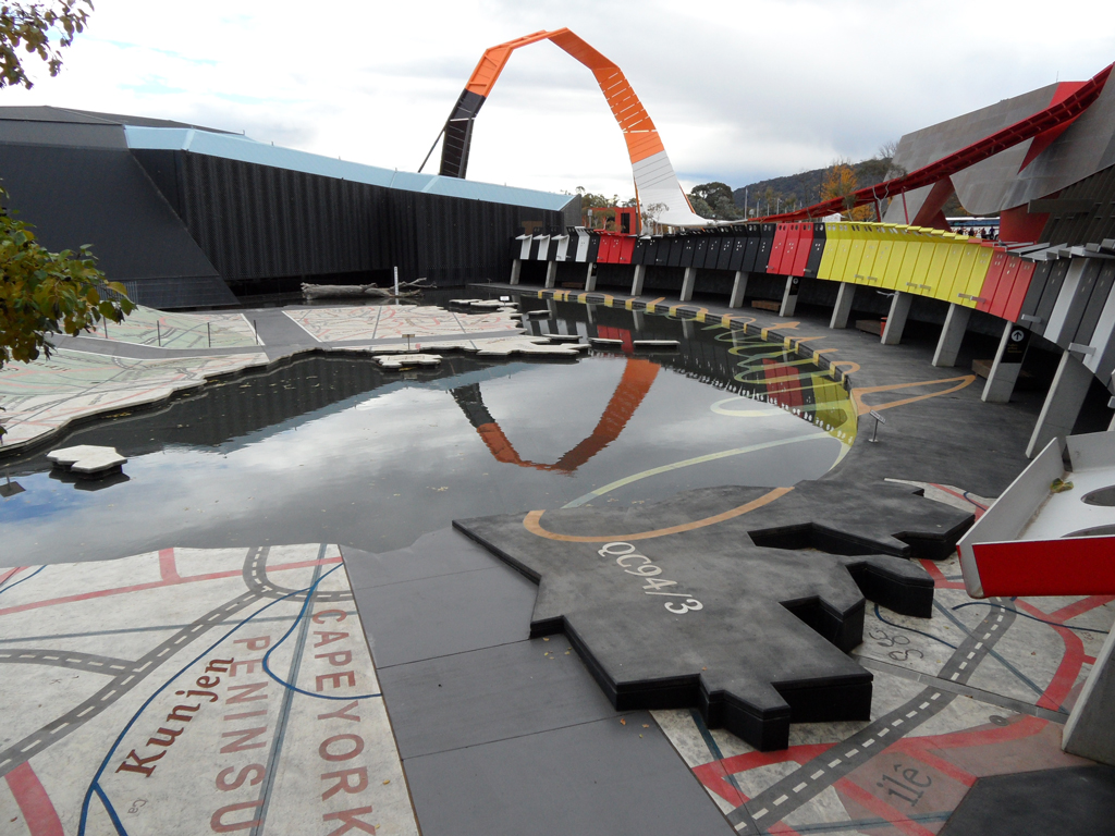 View of the Garden of Australian Dreams, with the NMA's loop in the background